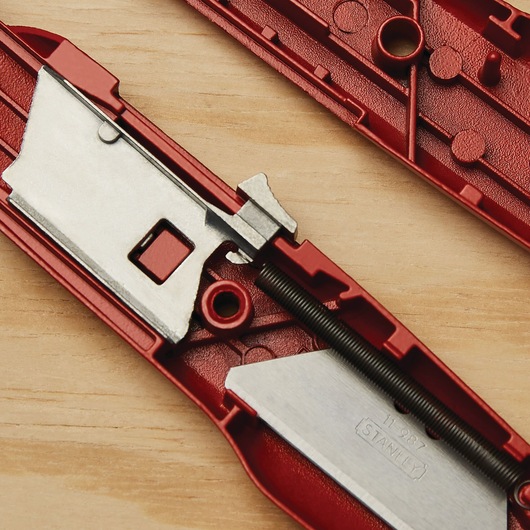 Closeup of Self retracting safety utility knife.